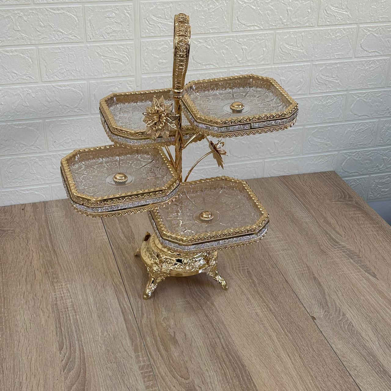 Etagère en acier inoxydable doré