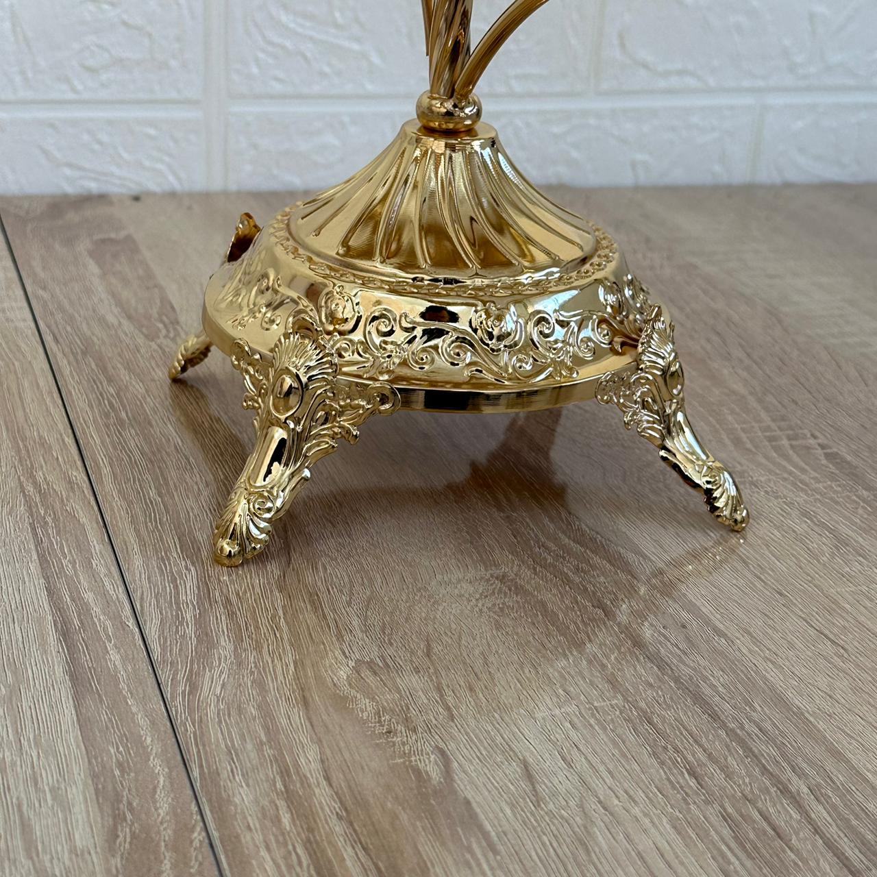 Etagère en acier inoxydable doré